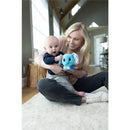 A smiling woman holds a baby while they play with the Lamaze Puffaboo™ Elephant sensory toy, featuring bright colors and soft textures.