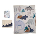 Three-piece dinosaur-themed crib bedding set featuring a quilt with colorful dinosaur designs, and coordinating solids.