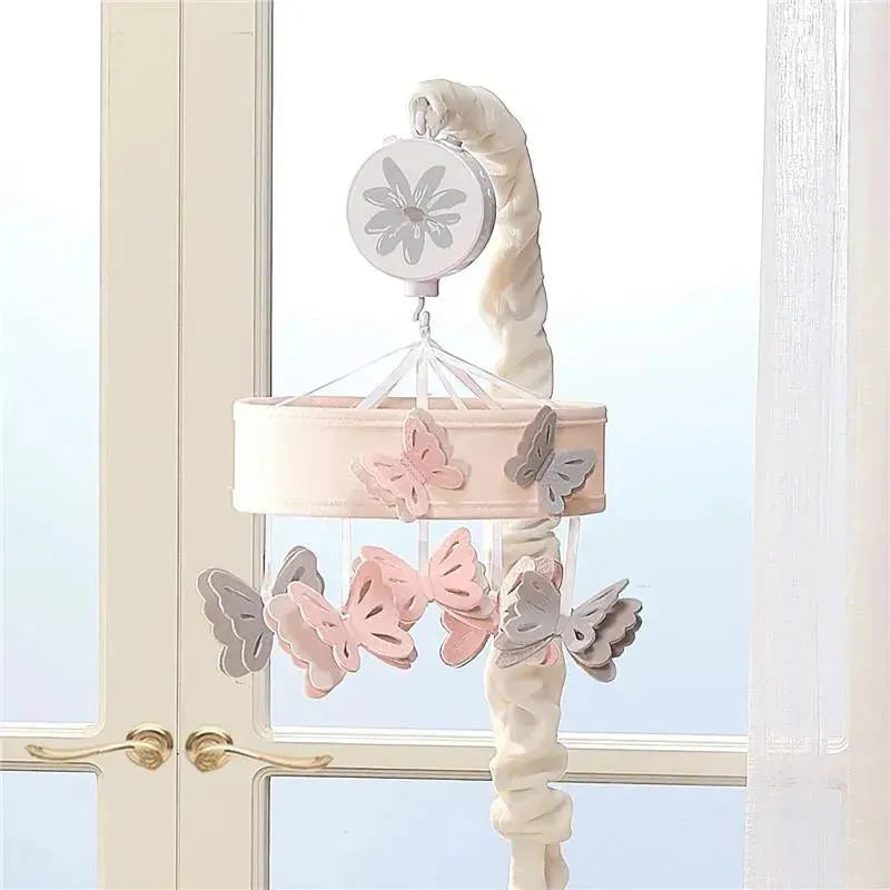 Pink and gray butterfly crib mobile with musical feature, designed for baby nurseries.