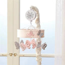 Pink and gray butterfly crib mobile with musical feature, designed for baby nurseries.