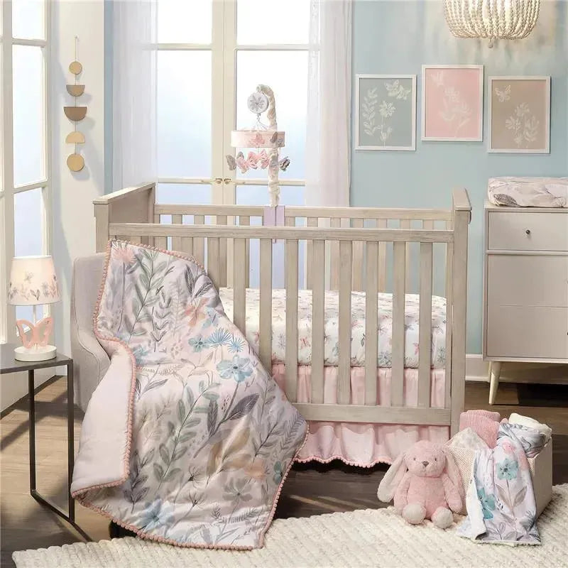 Soft changing pad cover featuring a watercolor floral and butterfly design, complemented by a nursery setting.