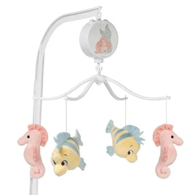 Musical baby crib mobile featuring plush seahorses and colorful fish, designed for infants with a Little Mermaid theme.