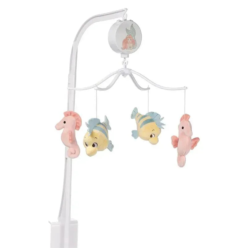 Musical crib mobile featuring plush characters from The Little Mermaid, including sea horses and fish, in soft pastel colors.