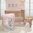 Disney Baby The Little Mermaid crib mobile and bedding set featuring Ariel and Flounder in a pastel nursery setting.
