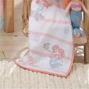White baby blanket featuring Ariel from The Little Mermaid, with pink stripes and ocean motifs. Ideal for infants.