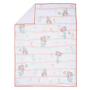 White baby blanket featuring Ariel and underwater motifs, with a pink striped border and soft fabric.