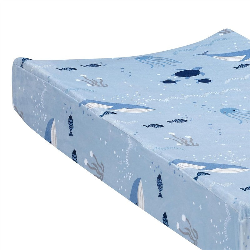 Lambs & Ivy Bubble & Squirt Changing Pad Cover featuring a light blue design with marine life illustrations.