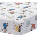 Fitted crib sheet featuring colorful construction vehicles like trucks, cranes, and dumpers on a white background.