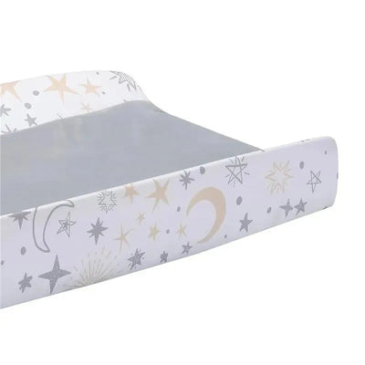 Changing pad cover featuring a celestial design with stars and moons in soft colors. Ideal for nursery use.