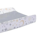 Changing pad cover featuring a celestial design with stars and moons in soft colors. Ideal for nursery use.
