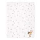 Ivory baby blanket featuring a pastel star and dot pattern, with a Winnie the Pooh illustration holding a jar.