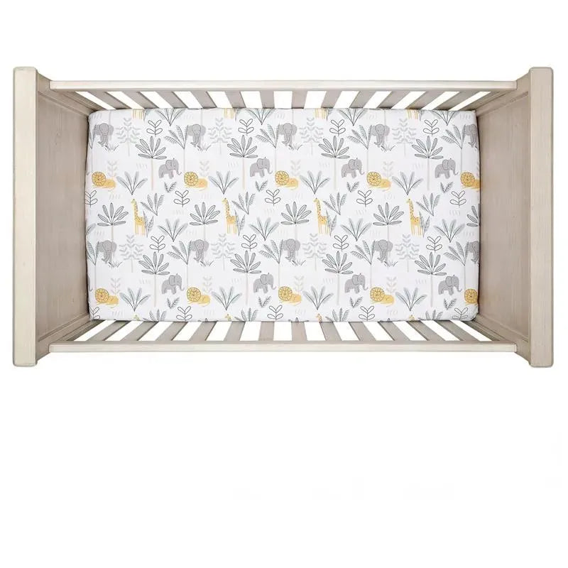 Jungle Adventure crib sheet featuring gray elephants and yellow giraffes on a white background with leaves.