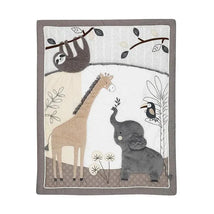 Four-piece baby bedding set featuring a quilt with a sloth, giraffe, elephant, and toucan, set against a soft jungle theme.