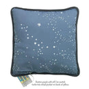 Light-up pillow with galaxy design, featuring white dots on a blue background; includes a battery pack tucked in a pocket.