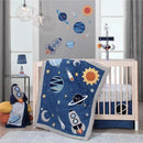 Plush blue and grey throw pillow featuring a rocket ship and celestial designs, perfect for a nursery.