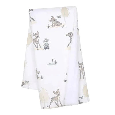 Lambs & Ivy Minky Sherpa Baby Blanket featuring Bambi and woodland animals on a soft white background.