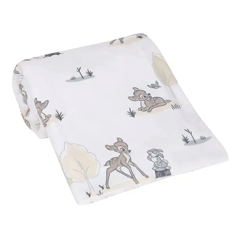 Minky Sherpa baby blanket featuring Bambi and woodland animals on a soft white background.