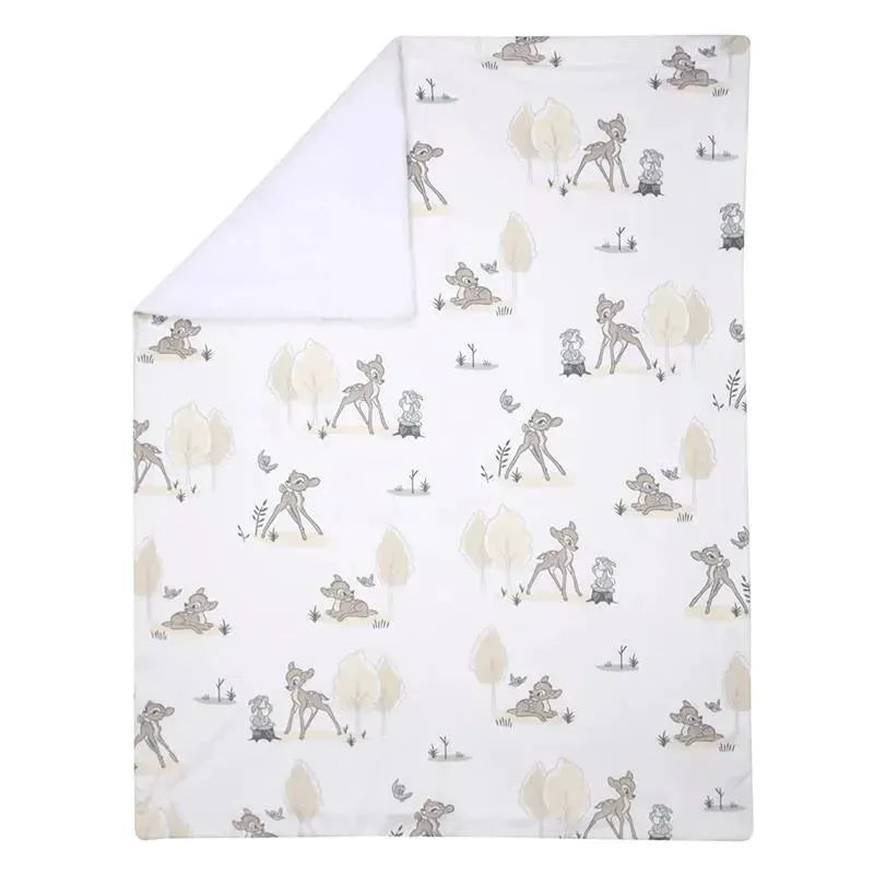 Minky Sherpa baby blanket featuring whimsical Bambi and woodland critters on a soft, white background.