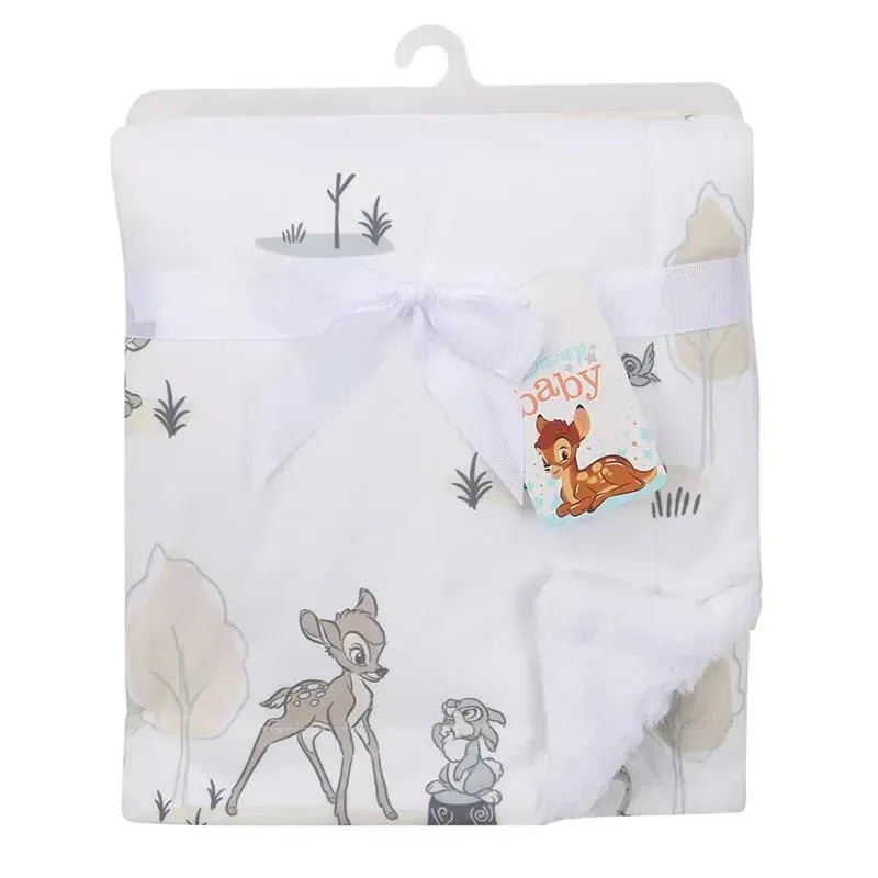 Lambs & Ivy Minky Sherpa Baby Blanket featuring Bambi and a bunny design, tied with a white ribbon and hang tag.