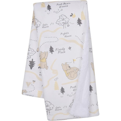 Lambs & Ivy Minky Sherpa Baby Blanket featuring Winnie the Pooh and playful illustrations of his friends and locations.