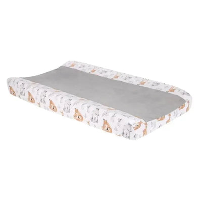 White minky changing pad cover featuring a painted forest pattern with woodland animals and a soft gray center.