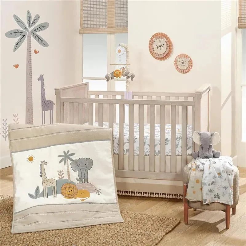 Plush elephant toy and quilt featuring a giraffe, lion, and palm tree in a nursery setting.