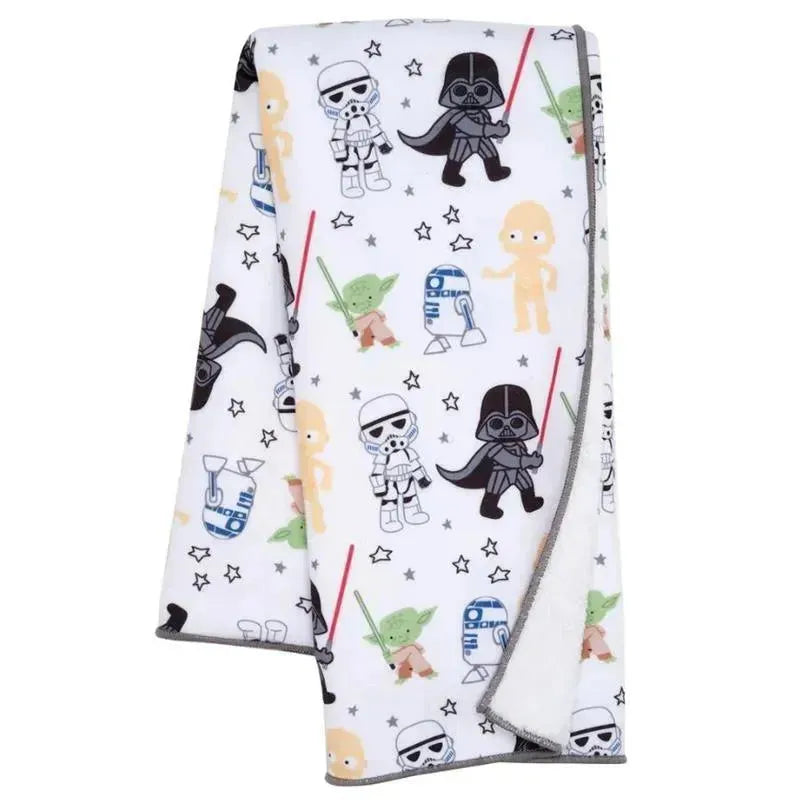 Star Wars Classic Blanket featuring cartoon characters like Darth Vader, Yoda, and Stormtroopers against a white background.