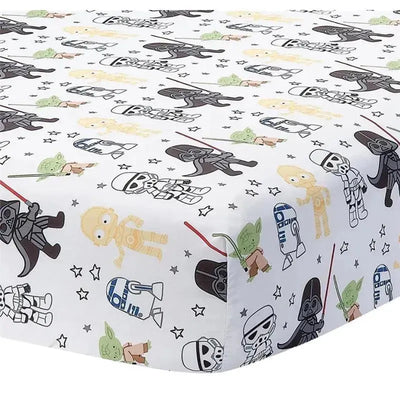 Lambs & Ivy Star Wars Classic Sheet featuring cute, cartoon-style characters like Yoda, Darth Vader, R2-D2, and C-3PO on a white background.