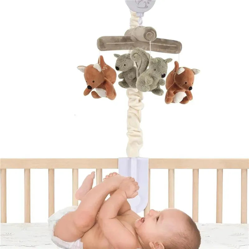 Musical mobile featuring plush fox and squirrel toys, designed to hang over a crib with a baby playing below.