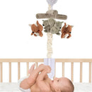 Musical mobile featuring plush fox and squirrel toys, designed to hang over a crib with a baby playing below.