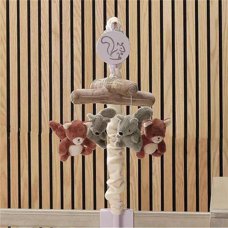 Musical mobile featuring plush fox and squirrel toys, designed to entertain and soothe infants.