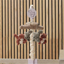 Musical mobile featuring plush fox and squirrel toys, designed to entertain and soothe infants.