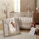 Lambs & Ivy Treetop Fox Musical Mobile above a crib, featuring a fox-themed quilt, stuffed animal, and nature-themed decor.