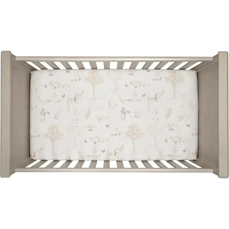Lambs & Ivy Treetop Fox crib sheet featuring a whimsical forest pattern with trees and woodland creatures in soft colors.