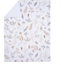 Woodland-themed blanket featuring illustrations of a squirrel, leaves, and flowers in soft, neutral colors.