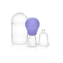 Lansinoh Latch Assist, a purple silicone breastfeeding aid with two clear cups and a storage case, facilitates latching for infants.