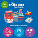 Mini Snack Shop Sorting Set features a toy food stand with assorted play food items and an order card, promoting imaginative and fine motor skills.