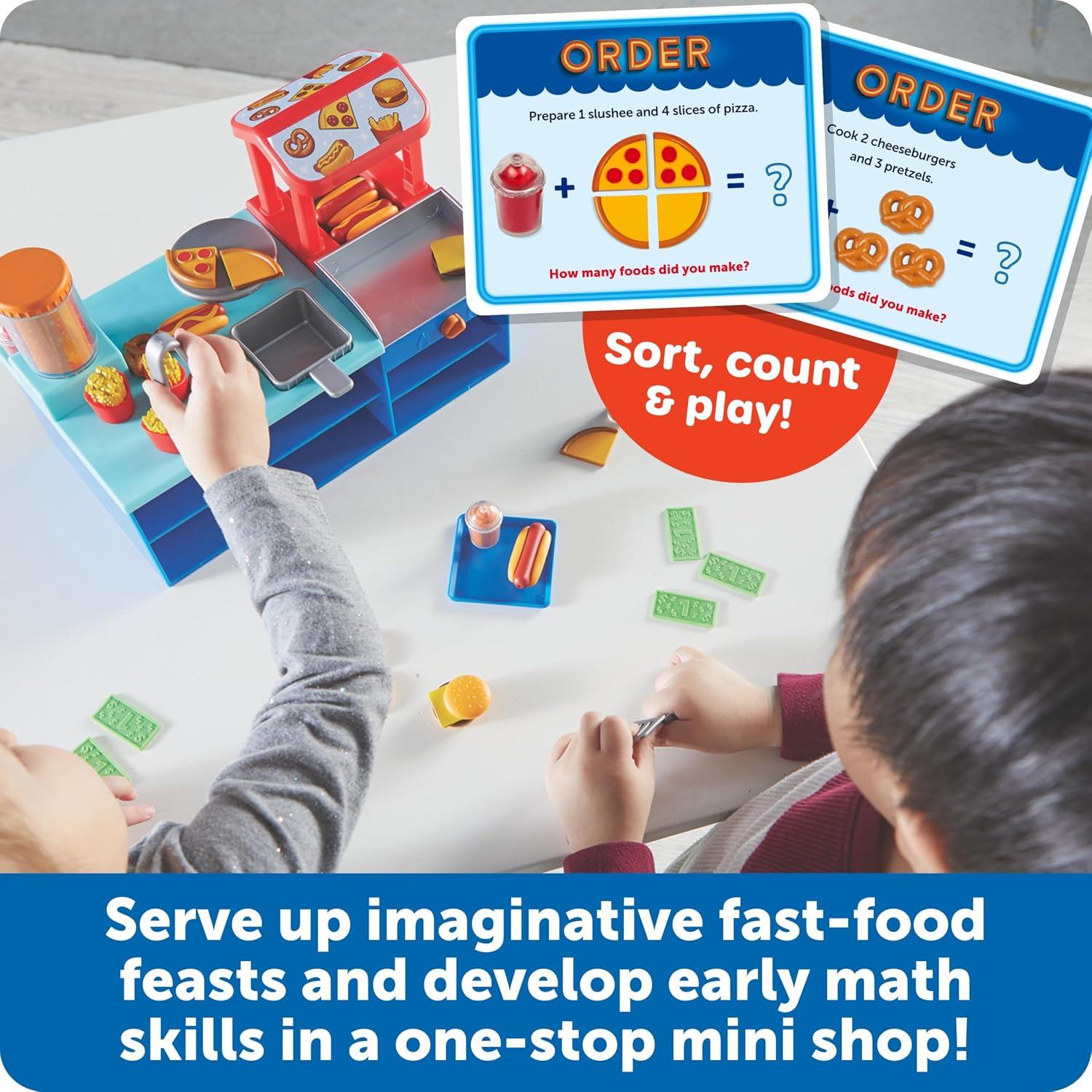 Mini Snack Shop Sorting Set with food pieces, play cash register, and order cards for math skill development.
