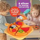 Children engaging in pretend play with the Learning Resources New Sprouts Pizza Night set, featuring a pizza with 6 slices and toppings.