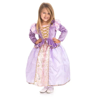 Toddler wearing a classic Rapunzel costume, featuring a purple dress with gold accents and puffed sleeves, smiling.