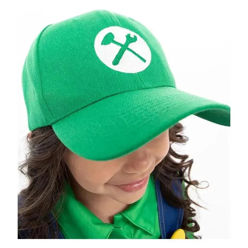 Green cap with a white logo featuring a wrench and hammer, worn by a child in a matching green shirt.