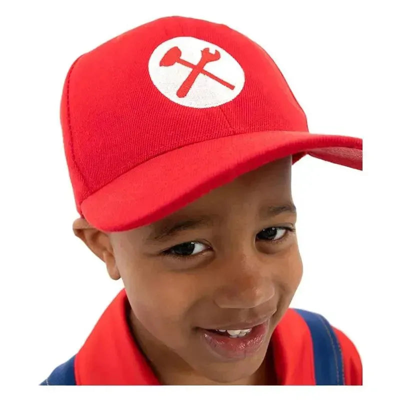 Red cap with a wrench logo worn by a smiling child in a red handyman costume.