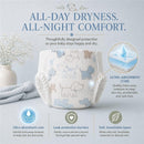 Soft, absorbent Little Me baby diaper in size 2, featuring cute puppy designs, emphasizing all-day dryness and comfort.