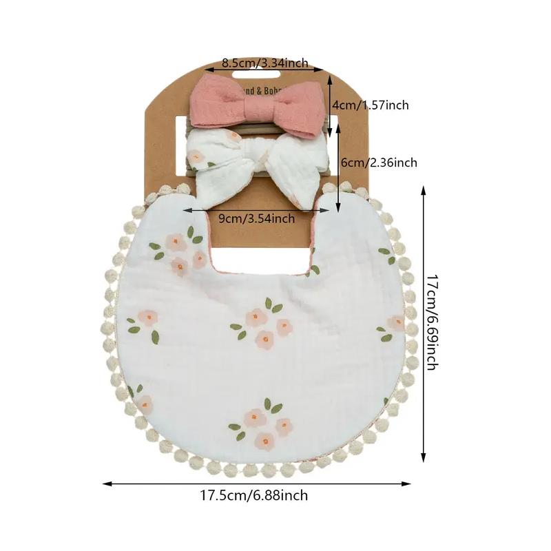 Baby floral cotton waterproof bib with pom-pom trim, accompanied by two matching bows headbands. Dimensions included.