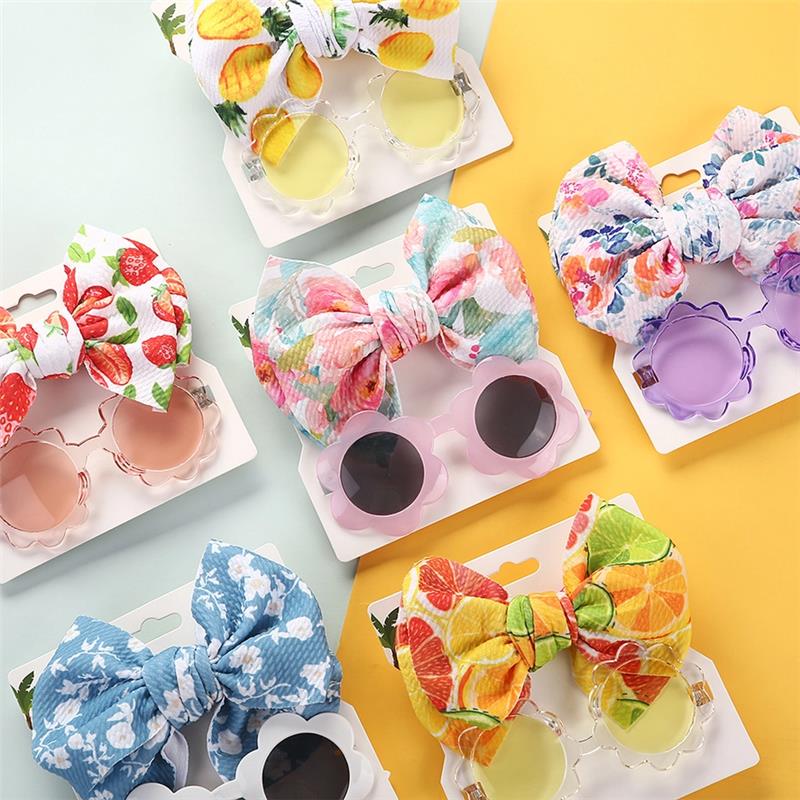 Baby girl summer sunglasses and floral headband set featuring colorful patterns, including strawberries and flowers, in various styles.