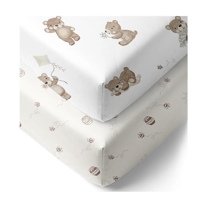 Cotton jersey fitted sheets featuring cute bear illustrations and honey pot designs in soft beige and white tones.