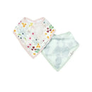 Bib set featuring two muslin bibs: one with a colorful floral pattern and the other in a soft green with bird designs.