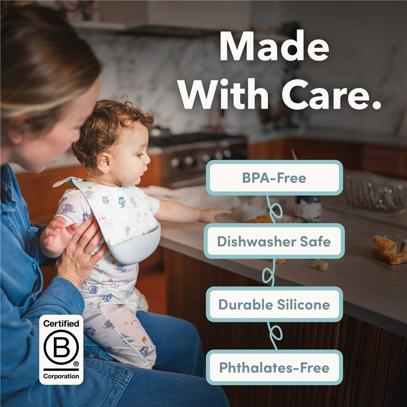 Silicone bib featuring a unicorn design, highlighting its BPA-free, dishwasher-safe, and phthalates-free characteristics.