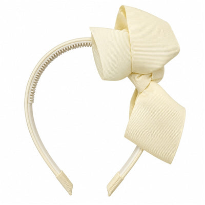 MacroBaby cream-colored baby headband with a large ribbed fabric bow