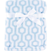 Coral fleece baby blanket in blue hexagon pattern, tied with a white ribbon, soft and cozy for infants.